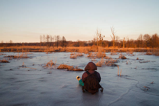 istock Pensive traveler resting on the ice 514062154