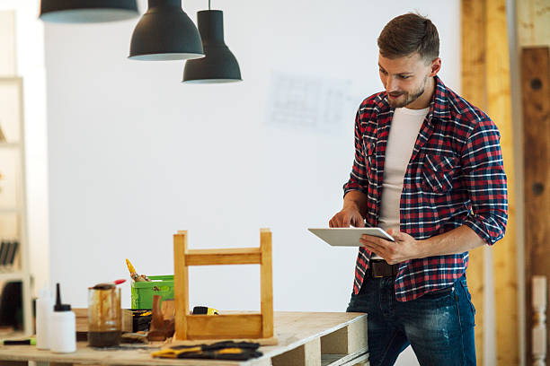 istock Designer Using Digital Tablet In His Furniture Workshop. 514064844