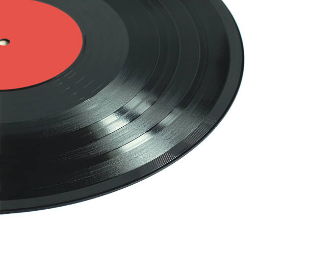 istock Part of black vinil disk isolated closeup 514065262