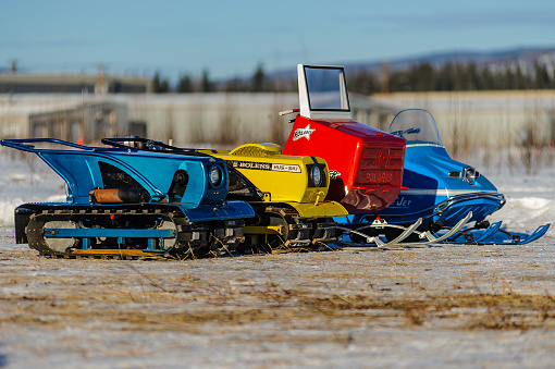 Fairbanks, Alaska, USA.-March, 05,2016:Vintage snowmobiles lined up and ready for the annual Tired Iron Vintage Snowmoblie race a community based event held in Fairbanks, Alaksa.