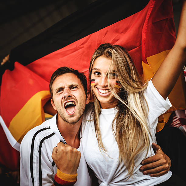 istock deutsch supporter at the soccer stadium 514067630