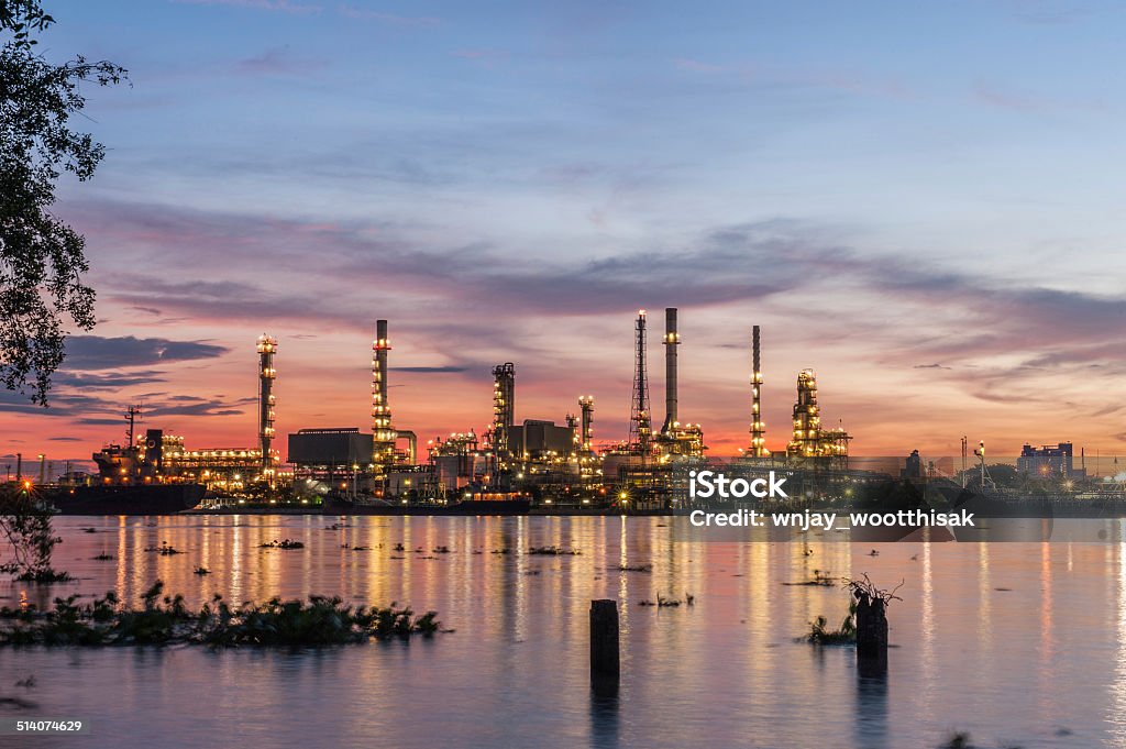 Oil refinery plant at sunrise Refinery plant in Thailand Air Pollution Stock Photo
