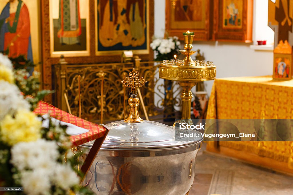 Church worship Orthodox Church and the interior, a cross and candles during worship Altar Stock Photo