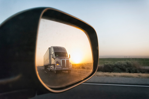 Truck seen in the side mirror, Southern California, USA