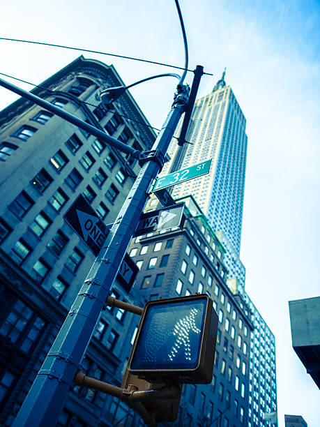 istock Toned Empire State Building and lamp pole in New York 514098680