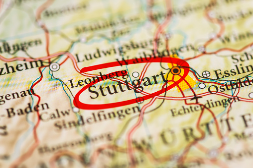 Stuttgart city circled with red marker on map. Close up shot