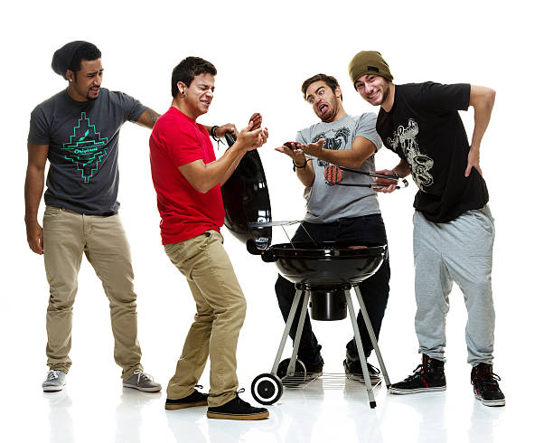 istock Social group of young men having a BBQ 514103377