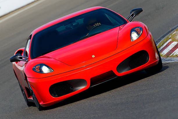 Ferrari F430 Zandvoort, The Netherlands - June 29, 2014: Ferrari F430 sports car driving on the Zandvoort race track during the 2014 Italia a Zandvoort day. ferrari ferrari f430 italian culture action stock pictures, royalty-free photos & images