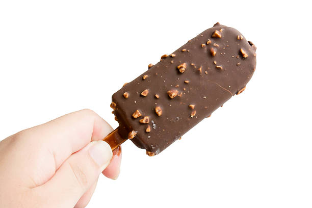 istock Hand holding ice cream. Isolated on a white background 514106537
