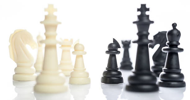 istock two side of chess face together business concept 514108151