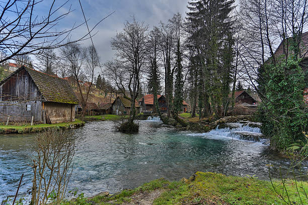 istock houses on the stream 514109438