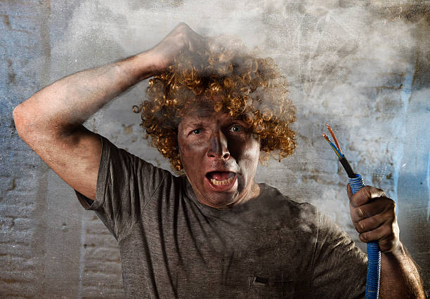 istock funny electrocuted man suffering domestic accident dirty burnt face shock 514109800