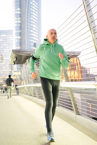 istock Mature Man Running Outdoors Wearing Sport Clothes 514110952