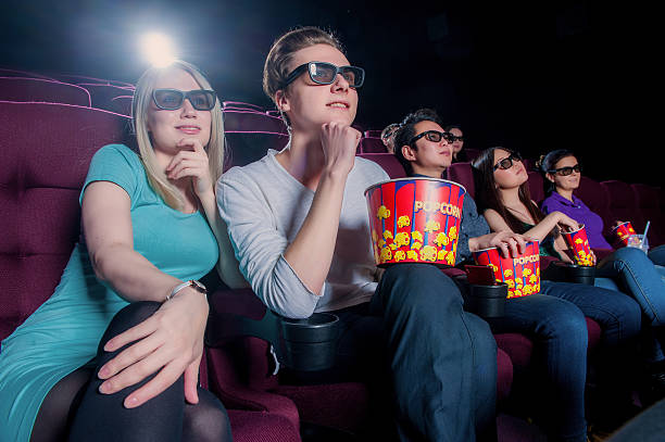 istock People in the cinema wearing 3d glasses 514114456