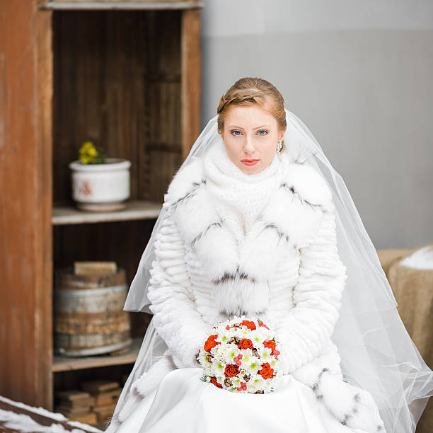 istock Beautiful bride with bouquet before wedding ceremony 514118368