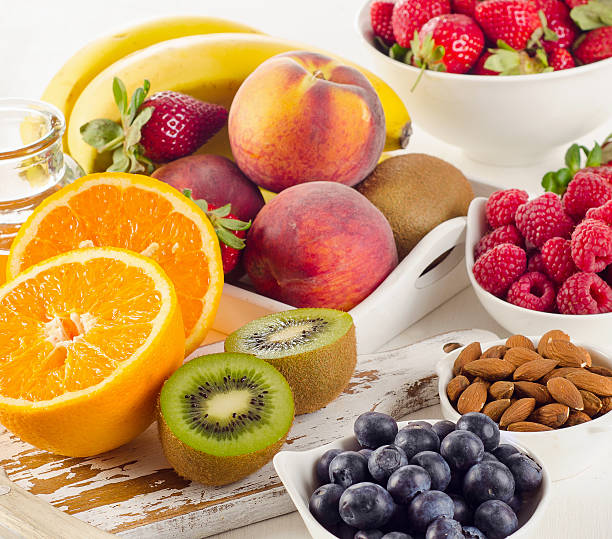 istock Mixed fresh fruits and berries. Diet eating. 514119808