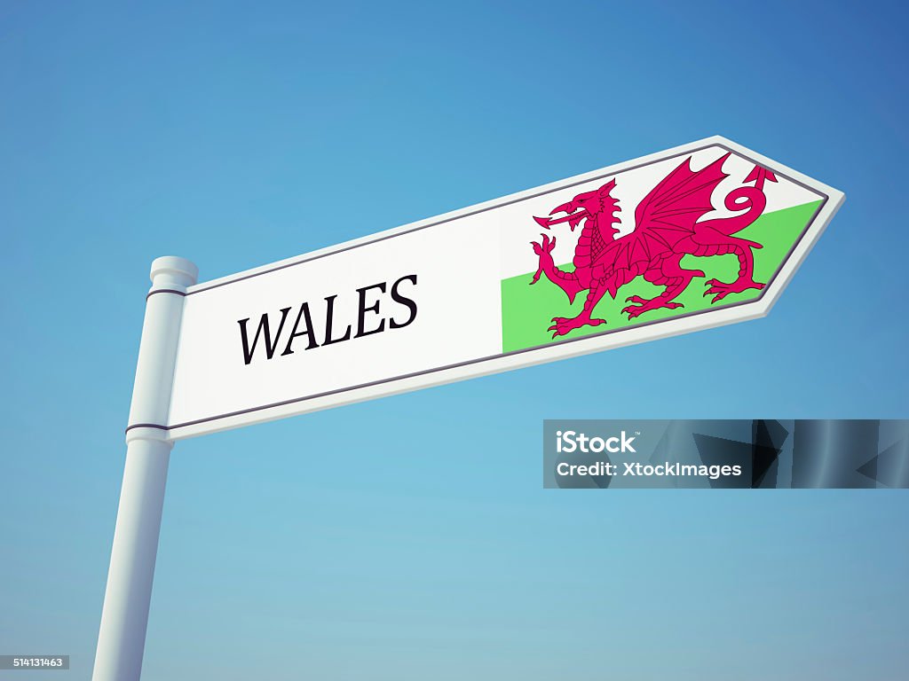 Wales Flag Sign Wales Flag Sign isolated on sky Crossroads Sign Stock Photo