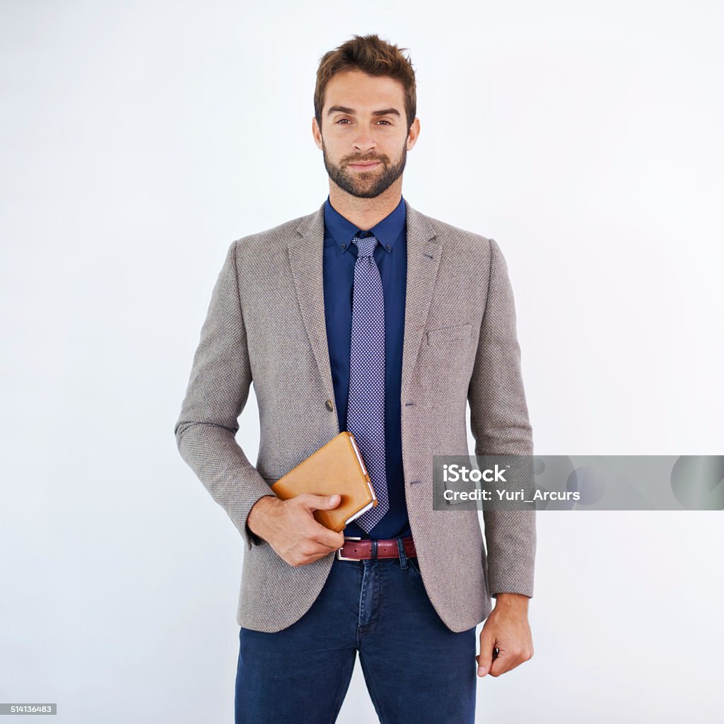 Always ready to add appointments Shot of a stylish businessman Men Stock Photo