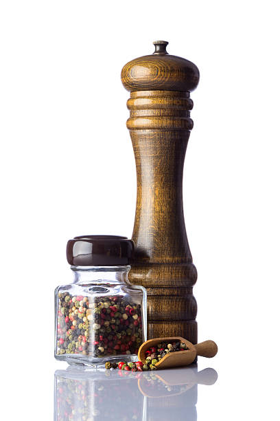 istock Pepper and Peppercorn with mill on White 514149692