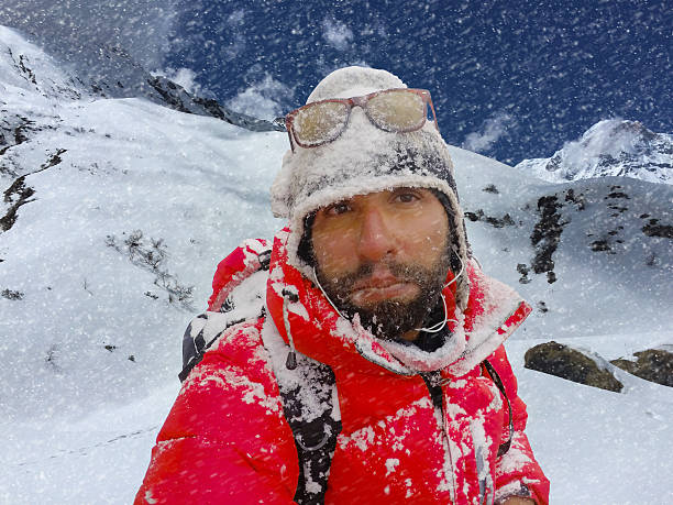 istock Climber in a snow storm in the mountains 514150038