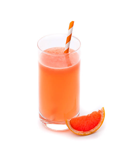 istock Glass of  grapefruit juice isolated on white 514151004