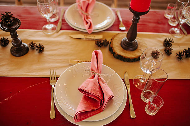 istock Cloth on a plate with cutlery on decorated red table 514151024