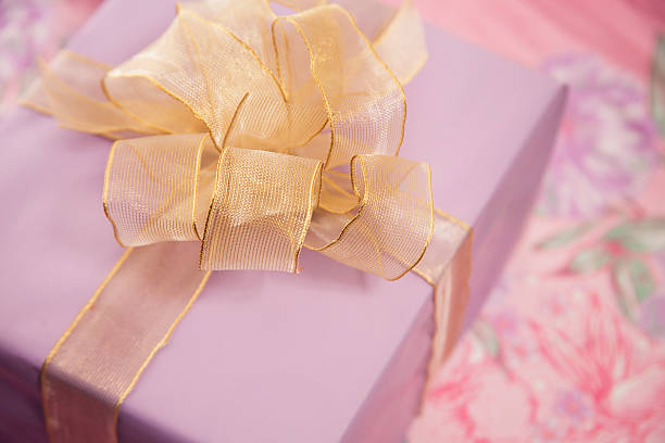 istock Purple wrapped birthday, Mother's Day gift. 514151074