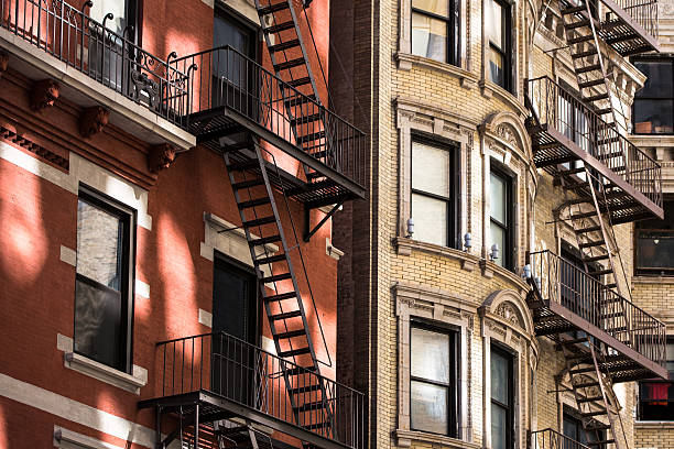 istock Old apartment building with fire escapes, Manhattan, New York Ci 514153616