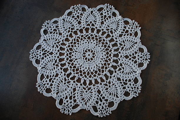 istock Crochet white ring napkin from cotton. 514154144