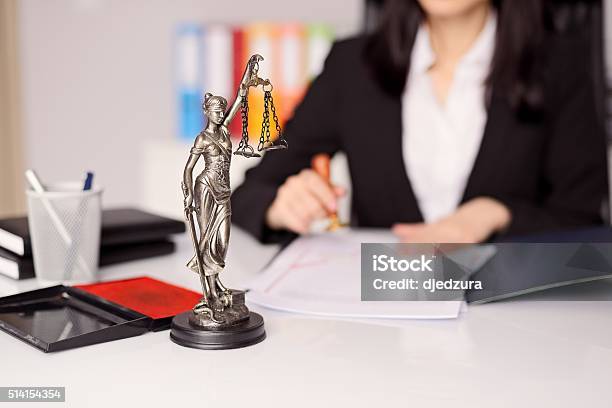Statuette Of Themis Goddess Of Justice On Lawyers Desk Stock Photo - Download Image Now