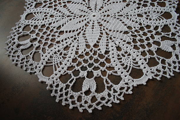 istock Crochet white ring napkin from cotton. 514154412