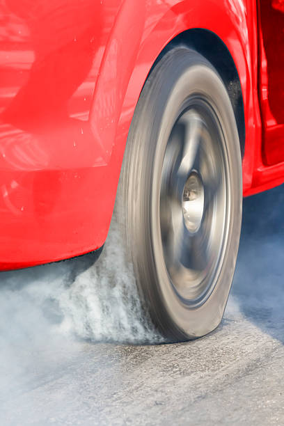istock car burns rubber off its tires 514158520