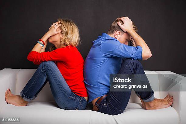 Couple With Their Backs Turned To Each Other Stock Photo - Download Image Now - Couple - Relationship, Arguing, Two People