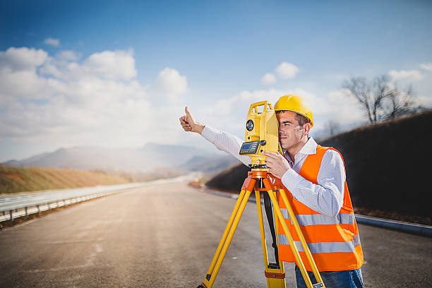 istock Land surveyor with total station 514160854