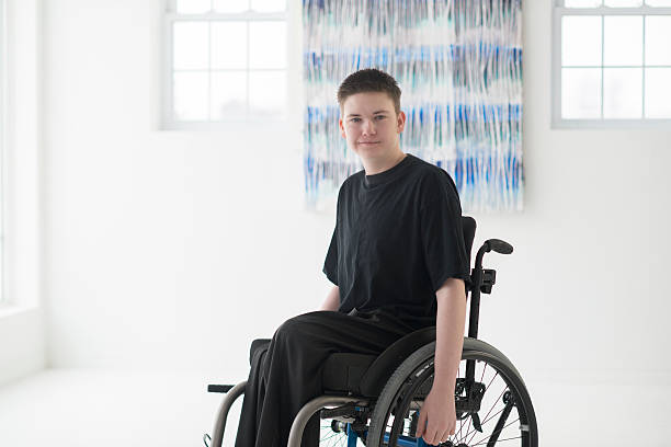 istock Happy Boy in a Wheelchair 514160940