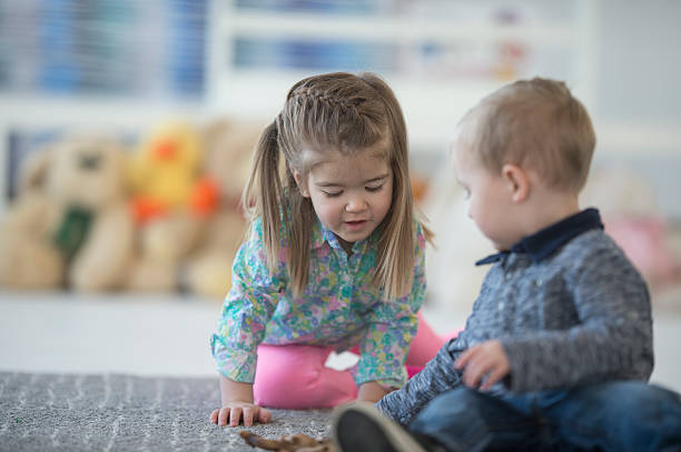 istock Sharing Toys in Preschool 514161160