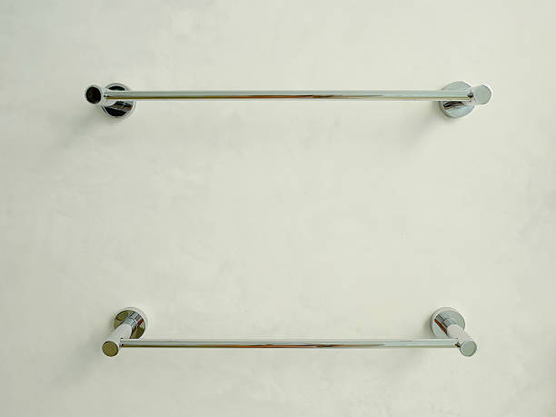 Towel racks on concrete wall Towel racks on concrete wall in the bathroom clothes hanger rod stock pictures, royalty-free photos & images