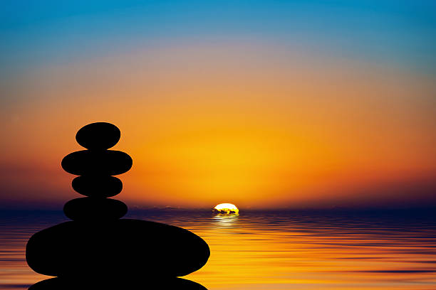 istock Silhouette of a stack of stones in the sunset 514165042