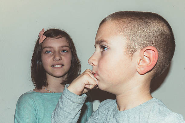 istock Brother and sister acting silly 514168026