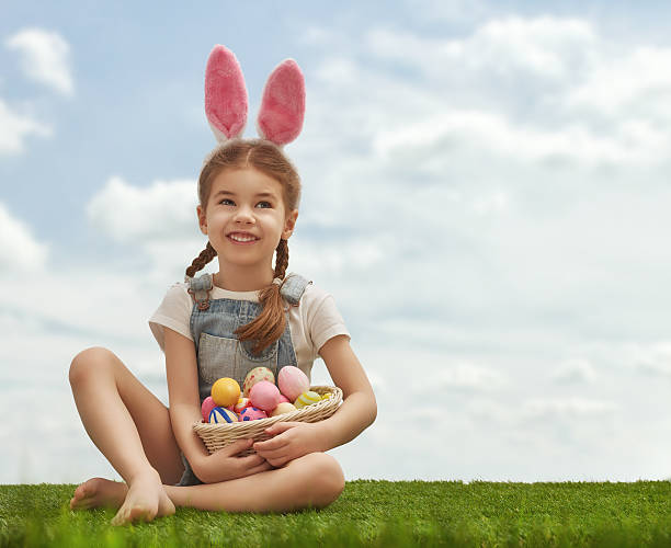 istock girl wearing bunny ears 514169380