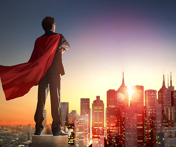istock superhero businessman looking at city 514169944
