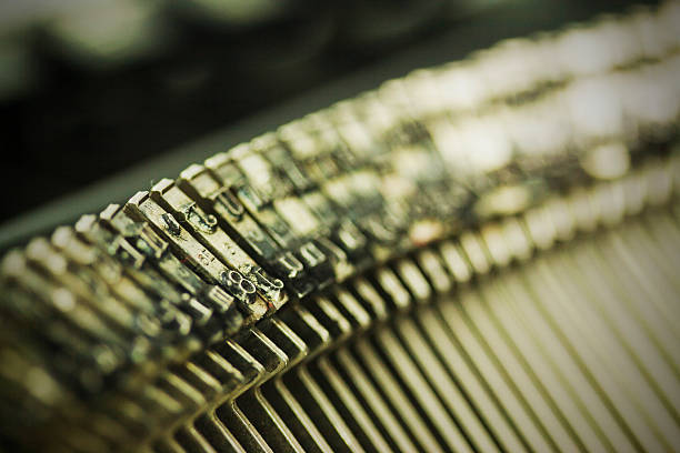 istock Hammer keys on an old type writer. Vintage filter. 514172548