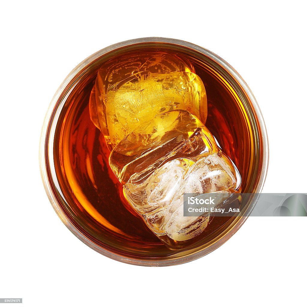 whiskey with ice whiskey glass with ice isolated on white background - top view Whiskey Stock Photo