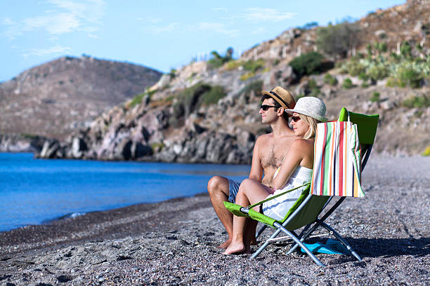 istock Young couple at the beach 514175193