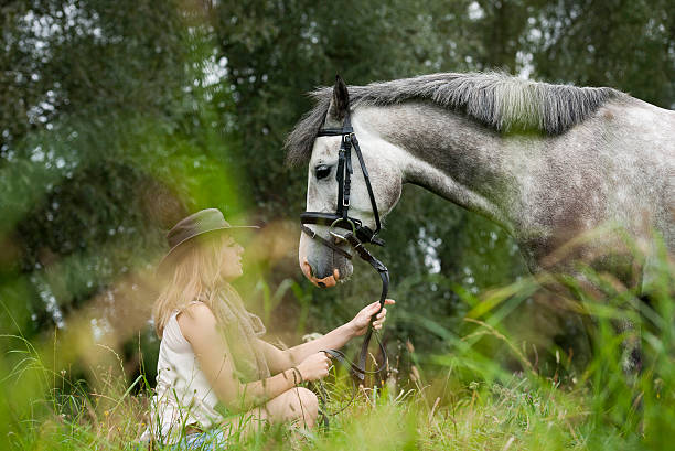 istock Beautiful woman and her horse 514177367