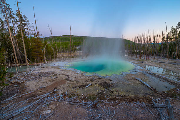 Cistern Spring Norris Geyser Norris Geyser Basin after Sunset Yellowstone National Park norris geyser basin photos stock pictures, royalty-free photos & images