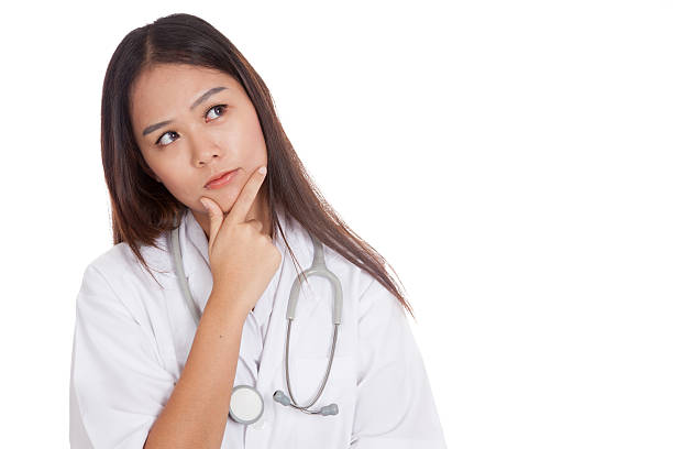istock Thoughtful, Young Asian female doctor 514179403