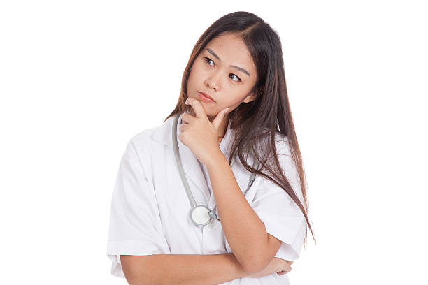 istock Thoughtful, Young Asian female doctor 514179419