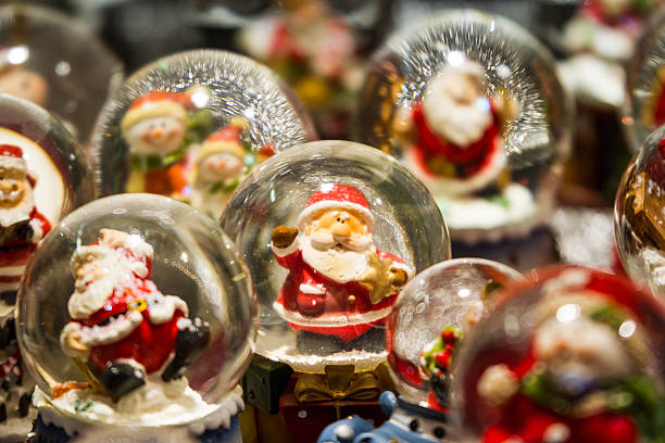 Different Christmas snow globes with Santa at Colmar Christmas Market