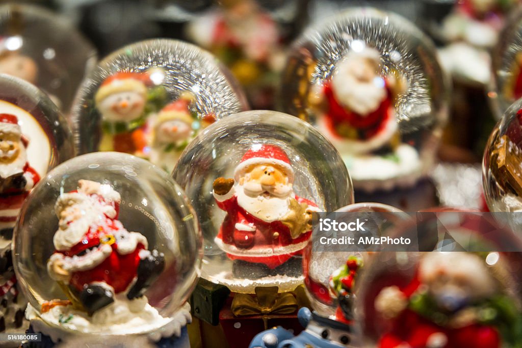 Santa and his friends Different Christmas snow globes with Santa at Colmar Christmas Market Snow Globe Stock Photo